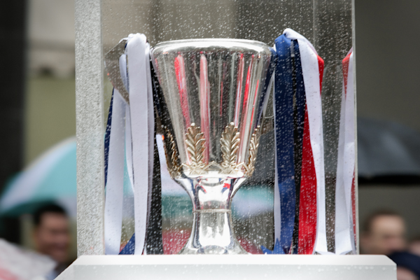 The AFL Premiership Cup, a silver trophy, decorated with ribbons ahead of a Grand Final