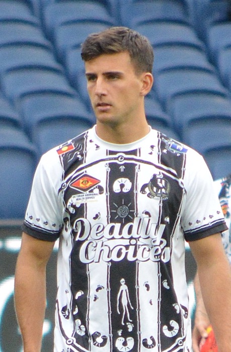 Nick Daicos in Collingwood playing kit during a 2025 AFL match at the MCG